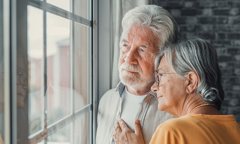 pensive,elderly,mature,senior,man,in,eyeglasses,looking,in,distance