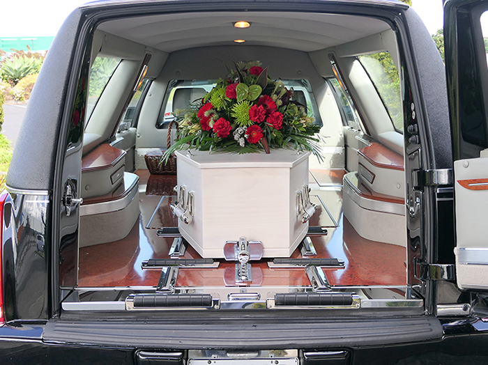 closeup,shot,of,a,funeral,casket,in,a,hearse,or
