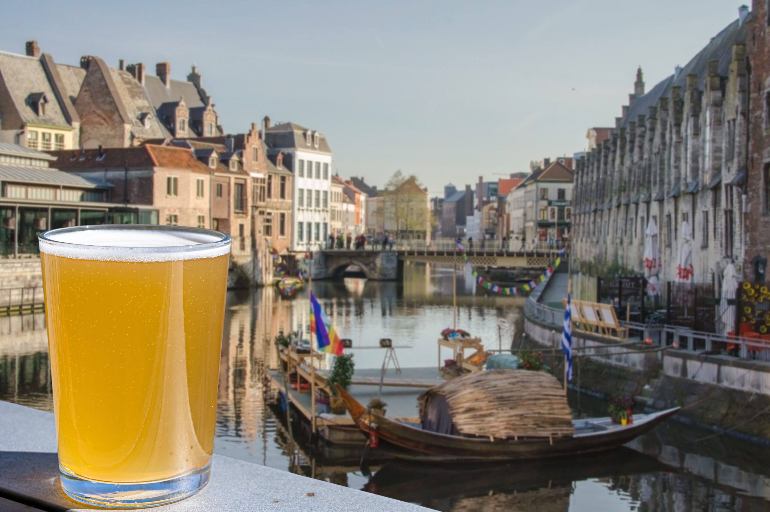 enjoy,glass,of,light,beer,with,view,of,canal,and