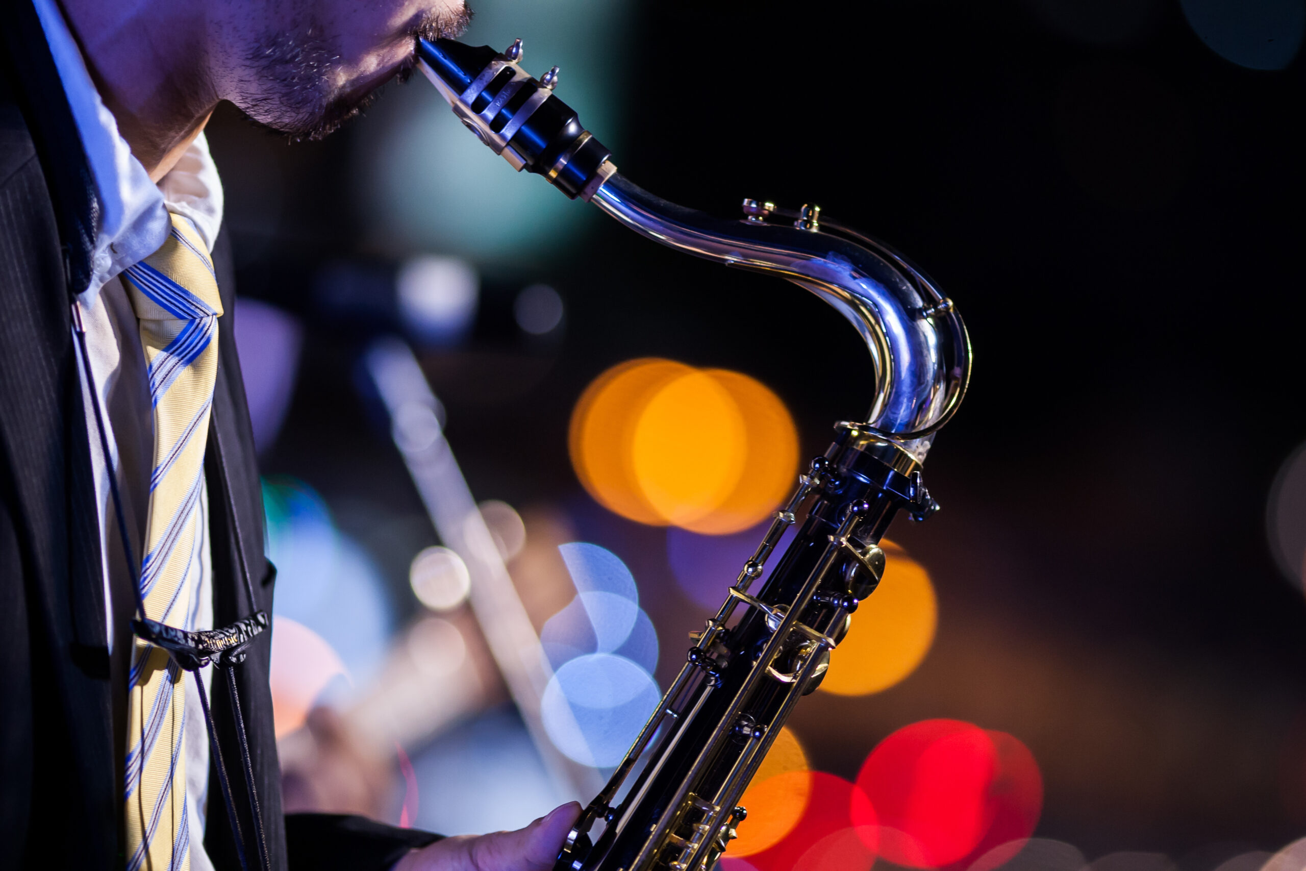 saxophone,player,with,bokeh,background