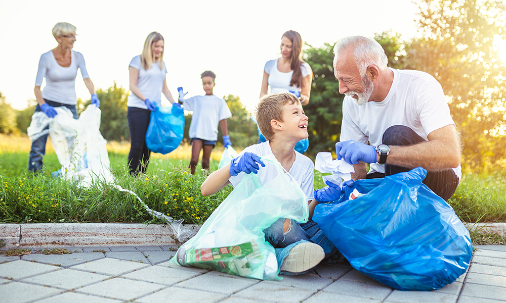 volunteers,with,garbage,bags,cleaning,up,garbage,outdoors, ,ecology