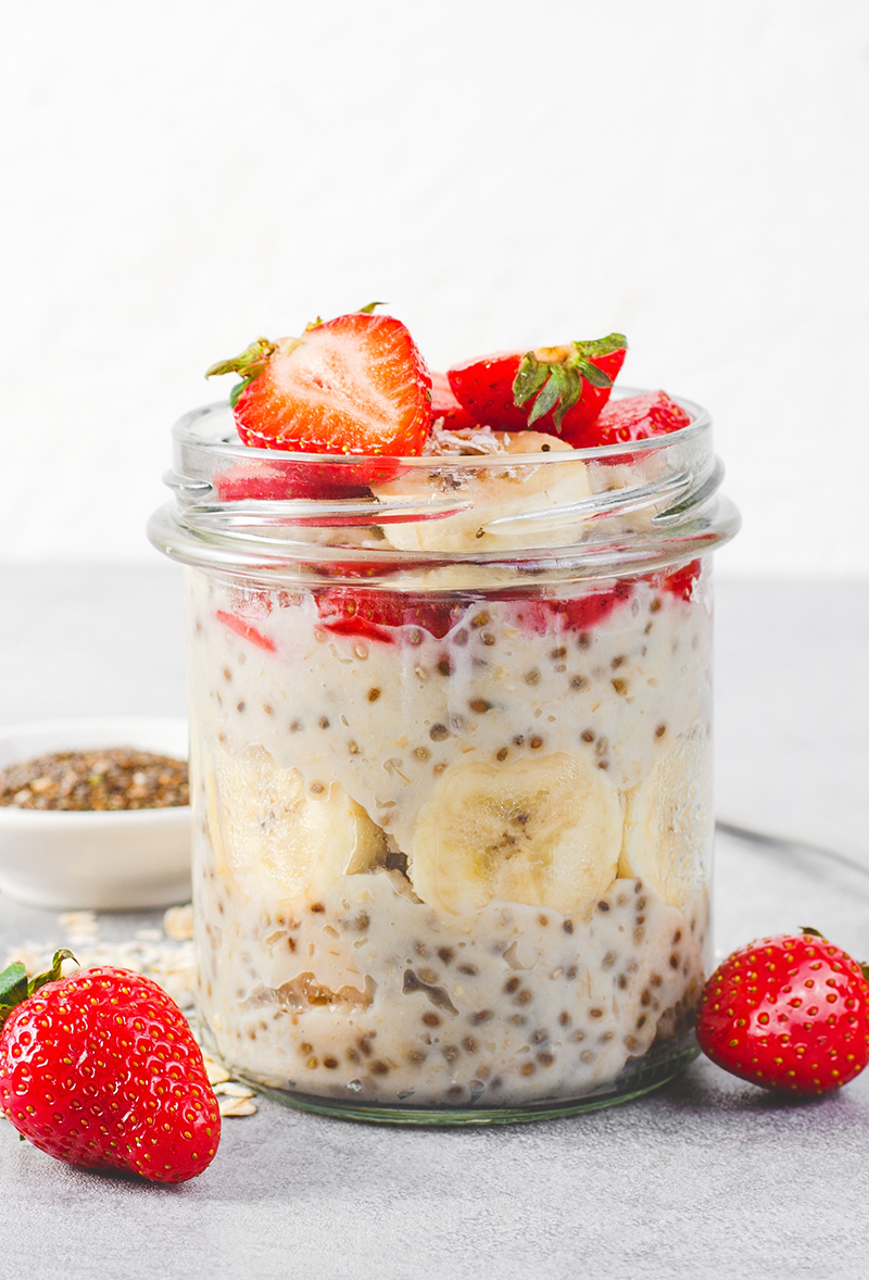 overnight,oats,with,fresh,strawberry,,banana,and,chia,seeds,in