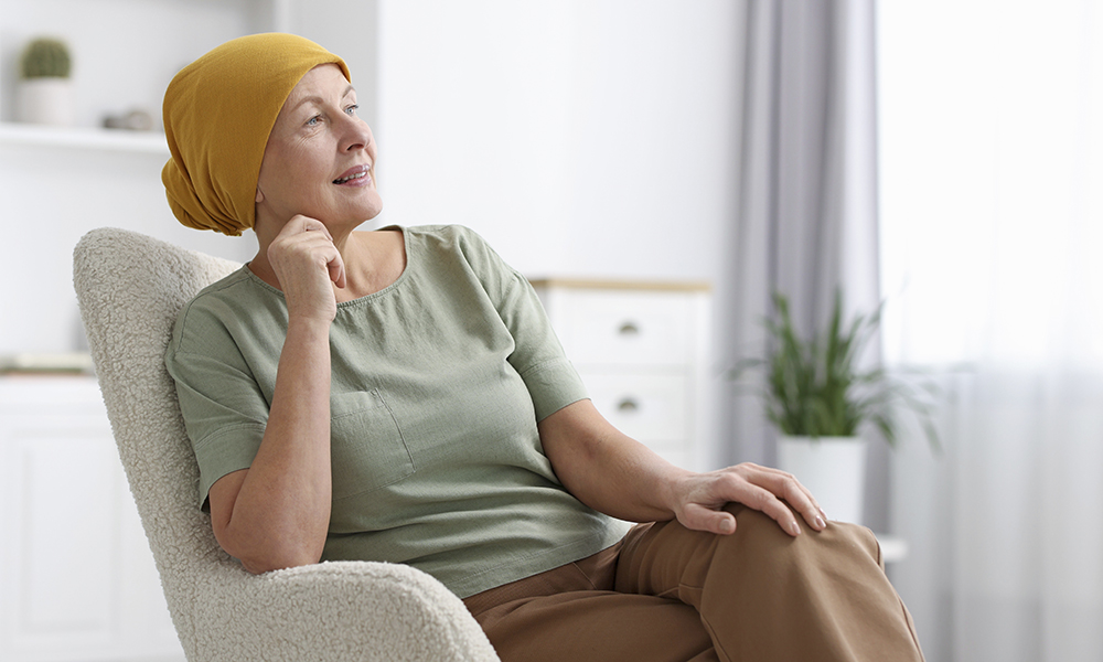 senior,woman,with,cancer,on,armchair,at,home