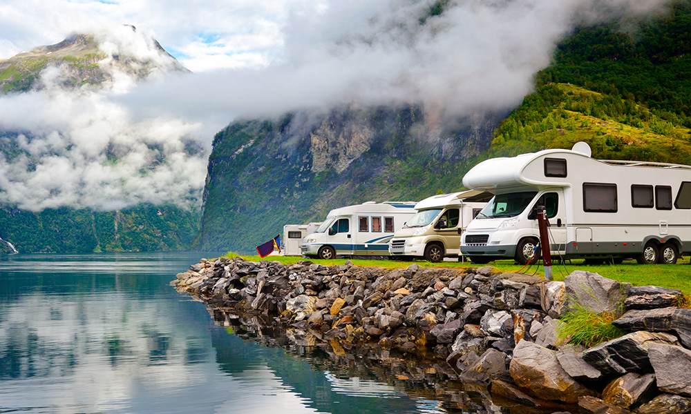 camper,van,recreational,vehicles,(rv),parked,at,norwegian,campsite,on