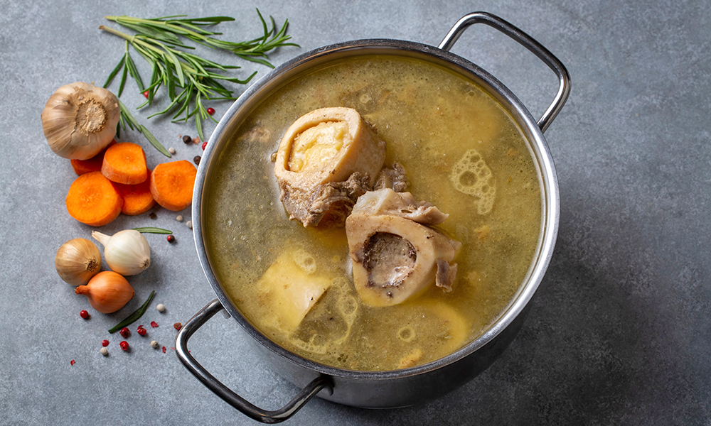 boiled,bone,and,broth.,homemade,beef,bone,broth,is,cooked
