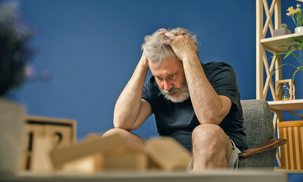 terrible,ordeals.,old,bearded,man,with,alzheimer,desease,sitting,on