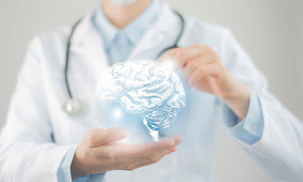 female,doctor,holding,virtual,volumetric,drawing,of,brain,in,hand.