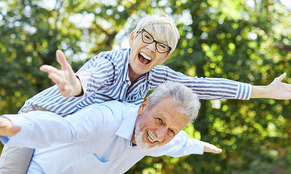 happy,active,senior,couple,having,fun,outdoors.,portrait,of,an