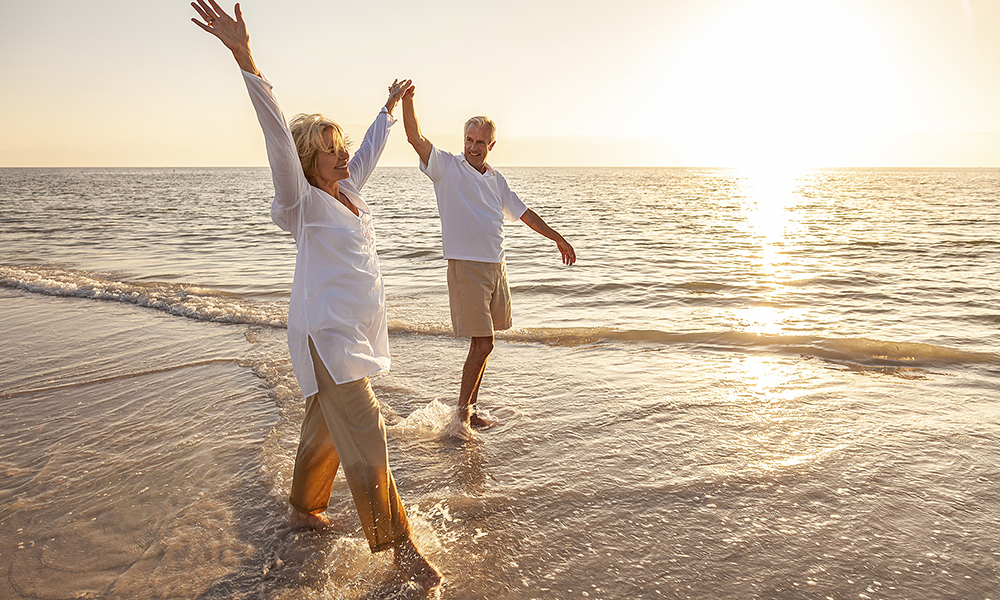 happy,senior,man,and,woman,old,retired,couple,walking,and