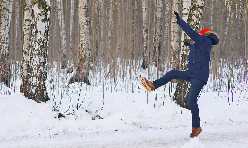 young,modern,man,slipped,and,lost,his,balance,during,a