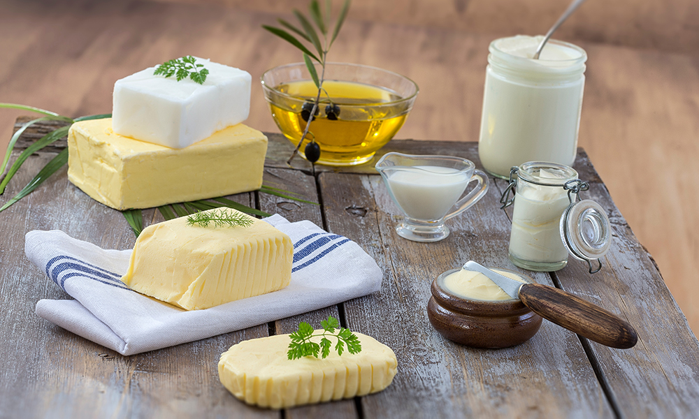 food,fats:,set,of,dairy,product,and,oil,on,wooden