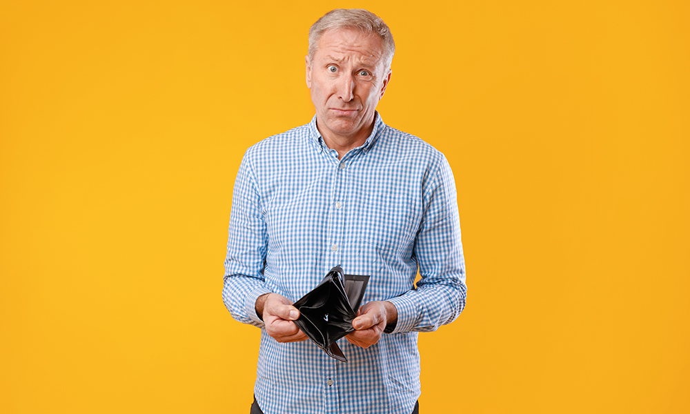 i'm,broke.,portrait,of,sad,mature,male,bankrupt,showing,his