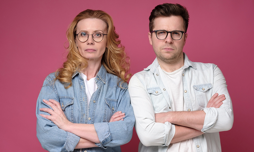 serious,business,team,of,mature,man,and,woman,in,glasses