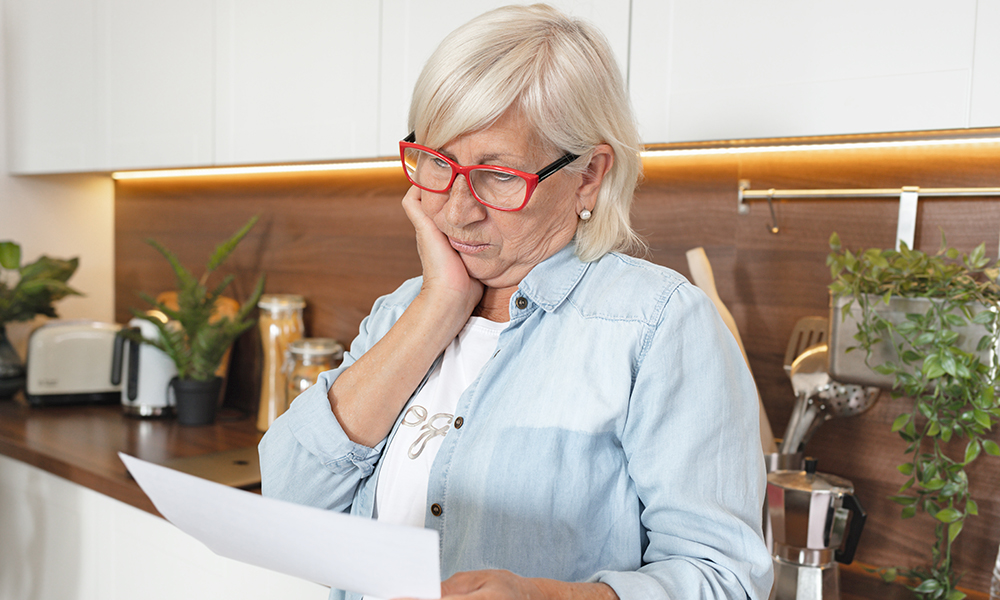 upset,adult,woman,financially,stressed,and,pressured,by,mortgage,debt