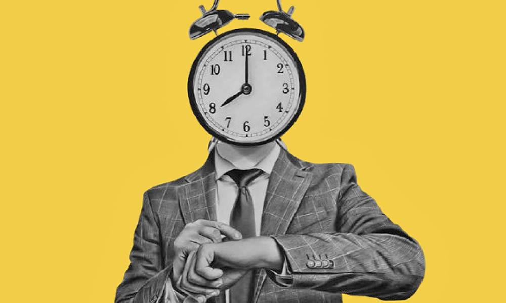 a,young,businessman,in,a,business,suit,headed,by,alarm