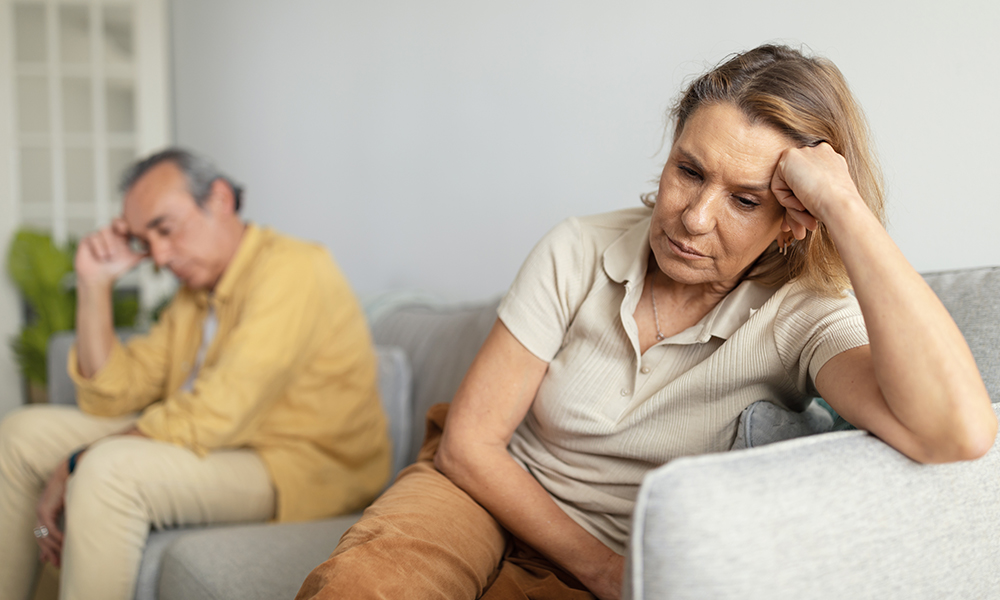 despaired,european,senior,woman,ignoring,husband,after,quarrel,,sitting,together
