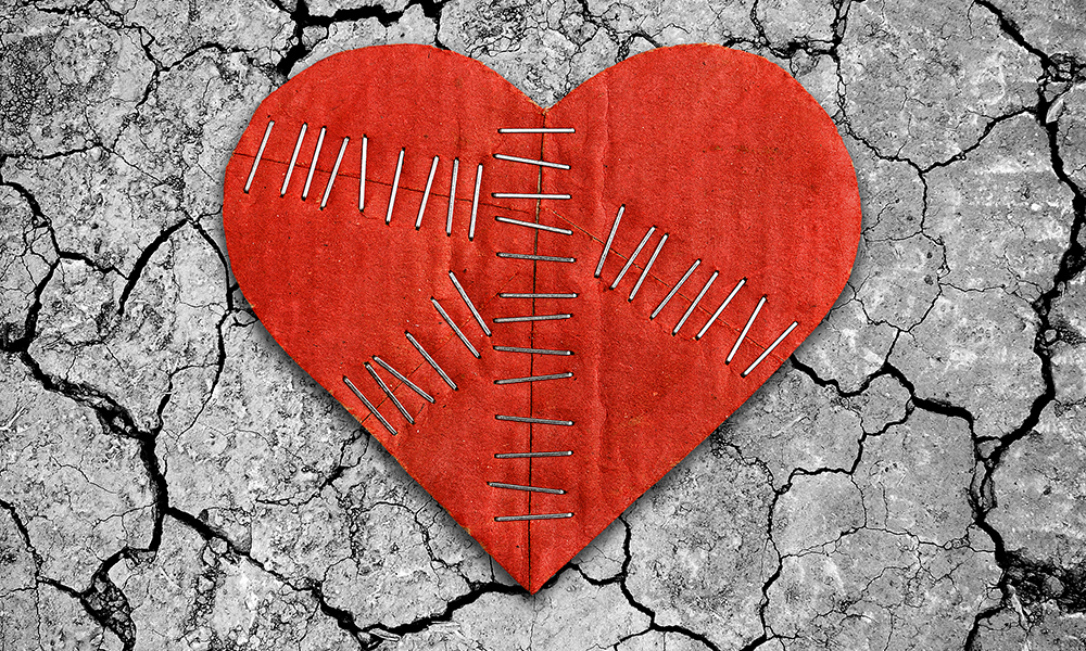broken,heart,on,dry,cracked,soil