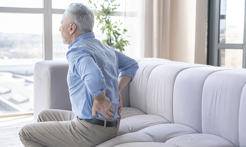 senior,caucasian,old,elderly,man,suffering,from,back,pain,at
