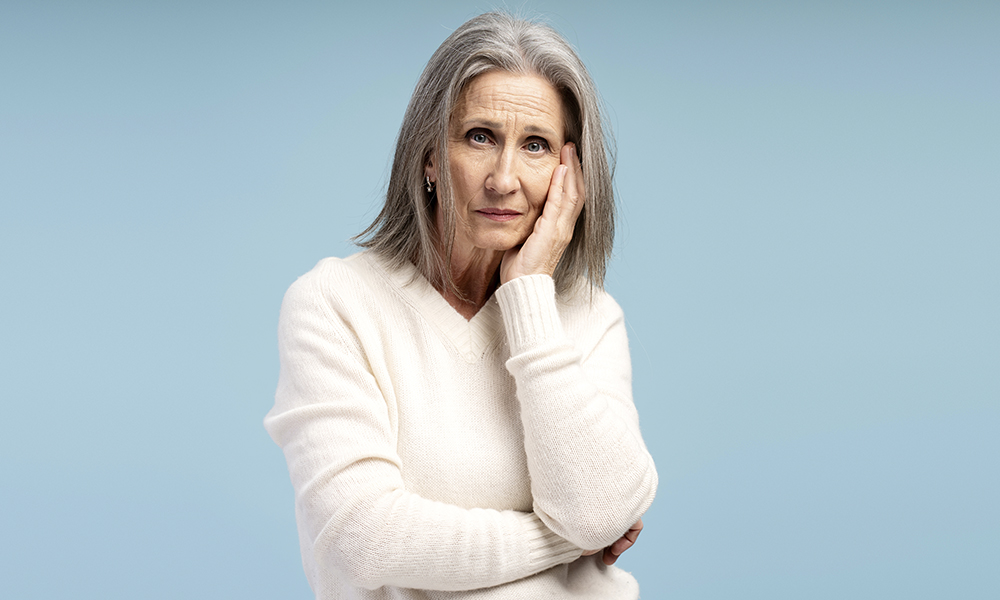 portrait,of,sad,,tired,mature,,gray,haired,woman,having,headaches,