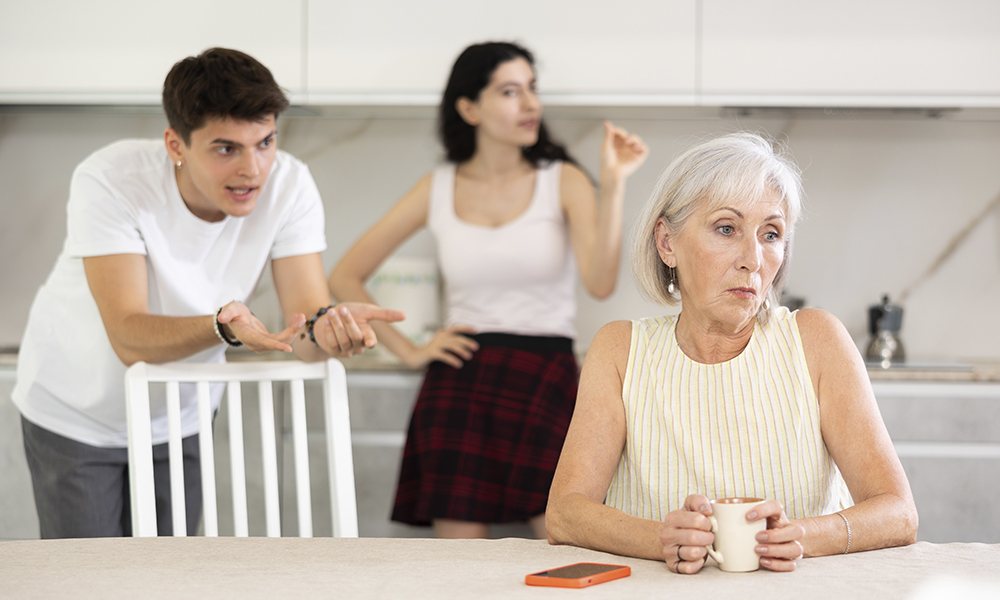 young,married,couple,shouts,at,elderly,mother.,family,conflict,between